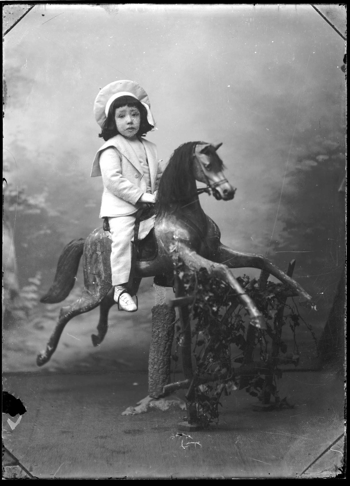 Retrato de menino a cavalo
